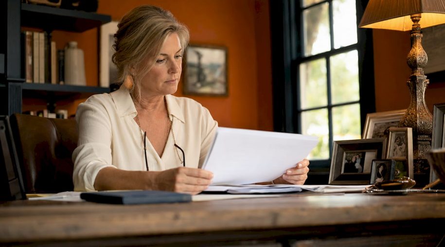Property manager reviewing guest data security documents