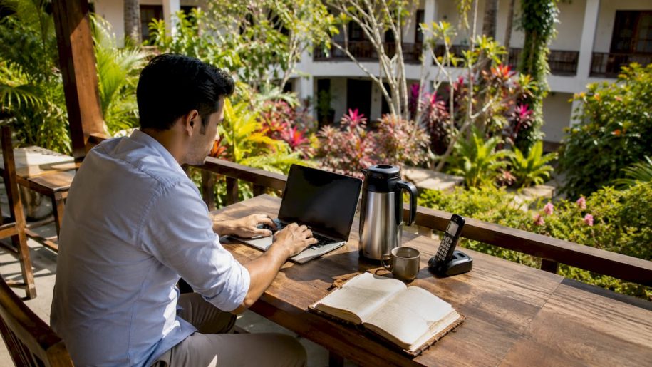 Hospitality operator reviewing AI automation at front desk